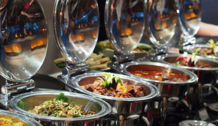 Four different meal options at a hotel buffet.